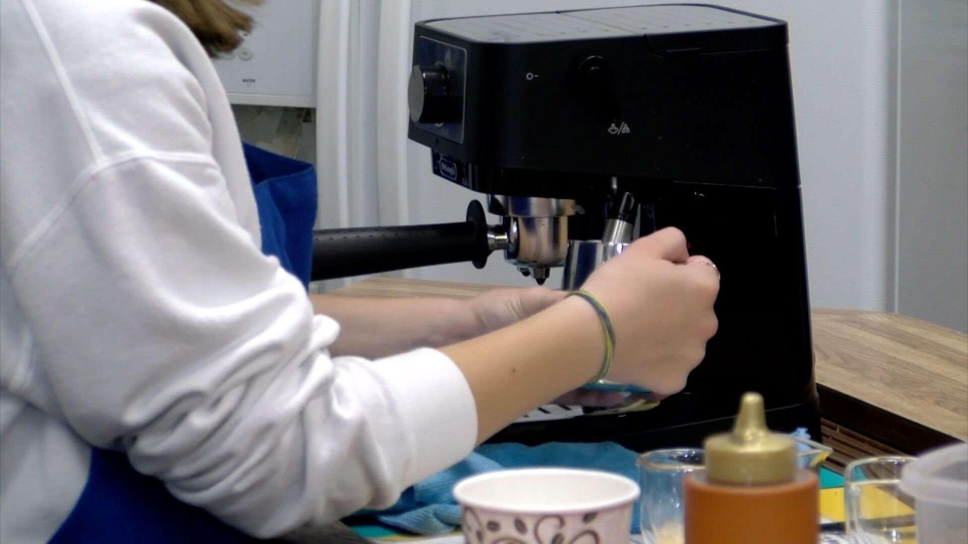 Tupelo High School students operating on-campus coffee shop.
